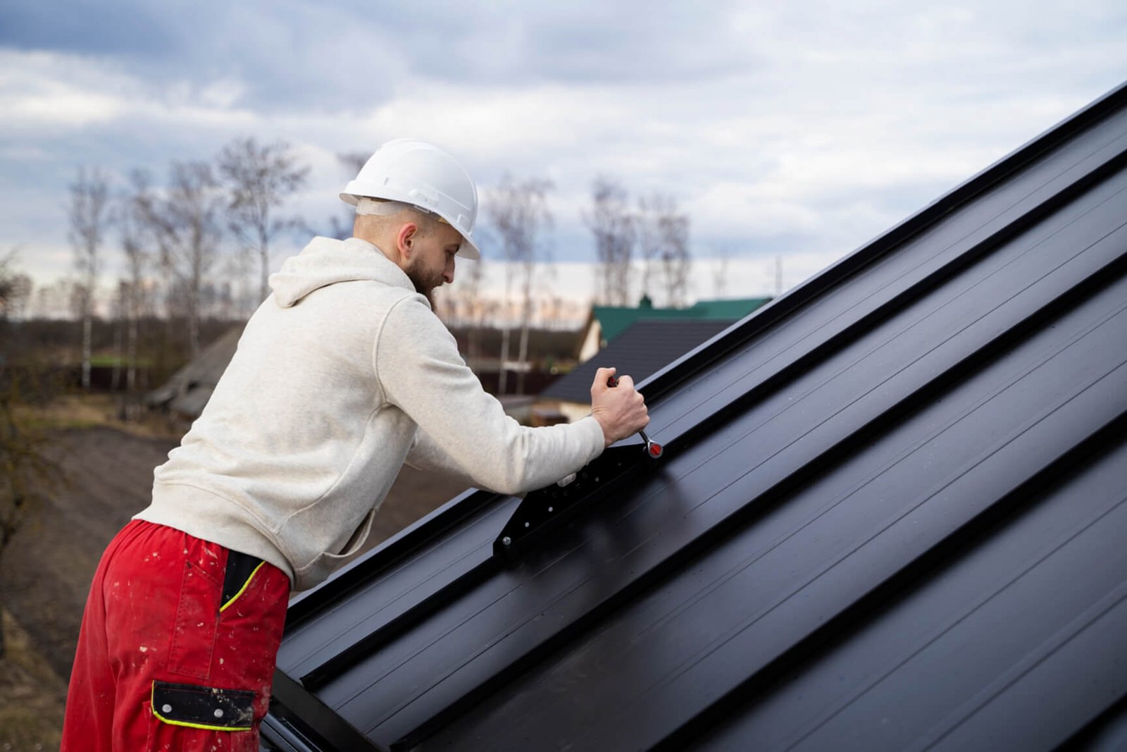 Man Making the Finishing Strong of the Roof